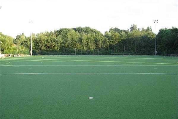 Renovatie kunstgras hockeyveld - Sportinfrabouw NV